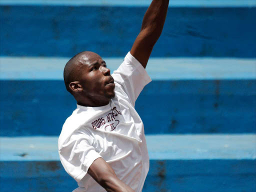 James Kanyari of the Kenya Deaf Volleyball team serves during a training session at the Nyayo National Stadium volleyball court, March 19, 2016. Photo/MOHAMMED AMIN (AADG)