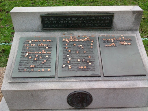 KENTUCKY HONORS HER SON, ABRAHAM LINCOLN, WHO DELIVERED HIS IMMORTAL ADDRESS AT THE SITE NOW MARKED BY THE SOLDIERS' MONUMENT   Four score and seven years ago our fathers brought forth on this...