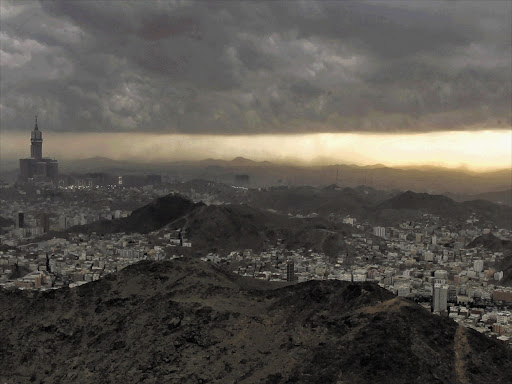 The sun sets over the holy city of Mecca as seen from the top of Mount Noor, where Muslims believe Prophet Mohammad received the first words of the Koran through Gabriel, during the annual haj pilgrimage October 21, 2012.