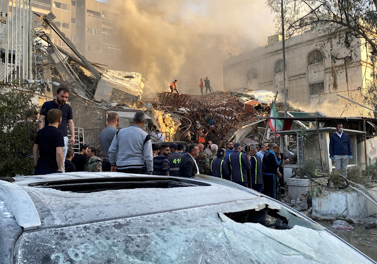 Smoke rises after what Iran says was an Israeli strike on a building close to the Iranian embassy in Damascus, Syria, April 1 2024. Picture: REUTERS/Firas Makdesi