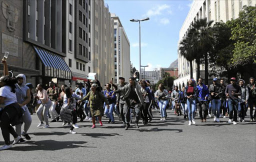 Students from the Cape Peninsula University of Technology protested outside the Cape Town municipal offices against the suspension of four students. The four were suspended in August after students disrupted a council meeting at the university’s Bellville campus.Picture RUVAN BOSHOFF