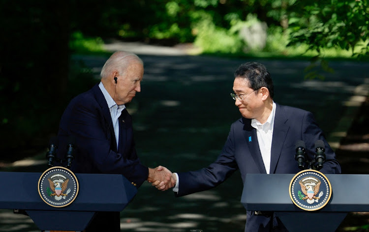 Japanese Prime Minister Fumio Kishida shakes hands with US President Joe Biden in Thurmont, Maryland, the US, August 18 2023. Picture: REUTERS/Evelyn Hockstein