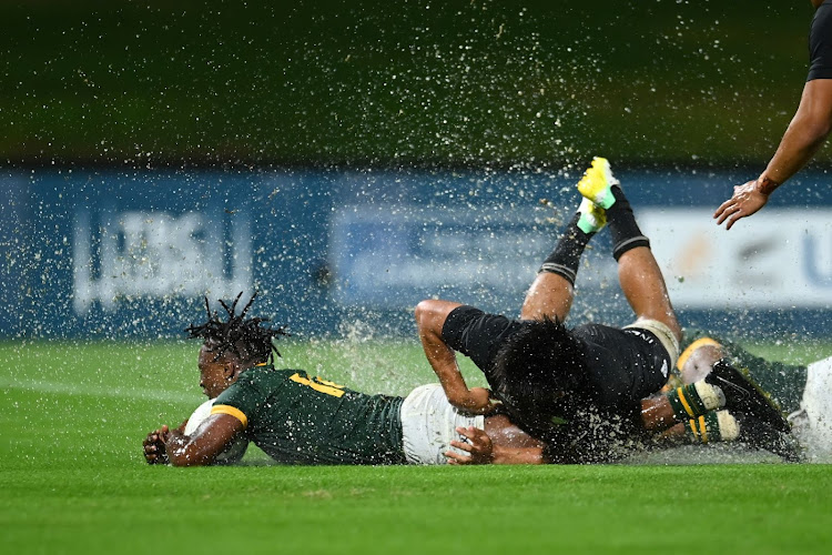 Joel Leotlela of South Africa scores a try during The Rugby Championship U20 Round 1 match against New Zealand at Sunshine Coast Stadium on Thursday.
