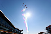 The Red Arrows perform above the circuit before the F1 Grand Prix of Great Britain at Silverstone on July 18, 2021 in Northampton, England.