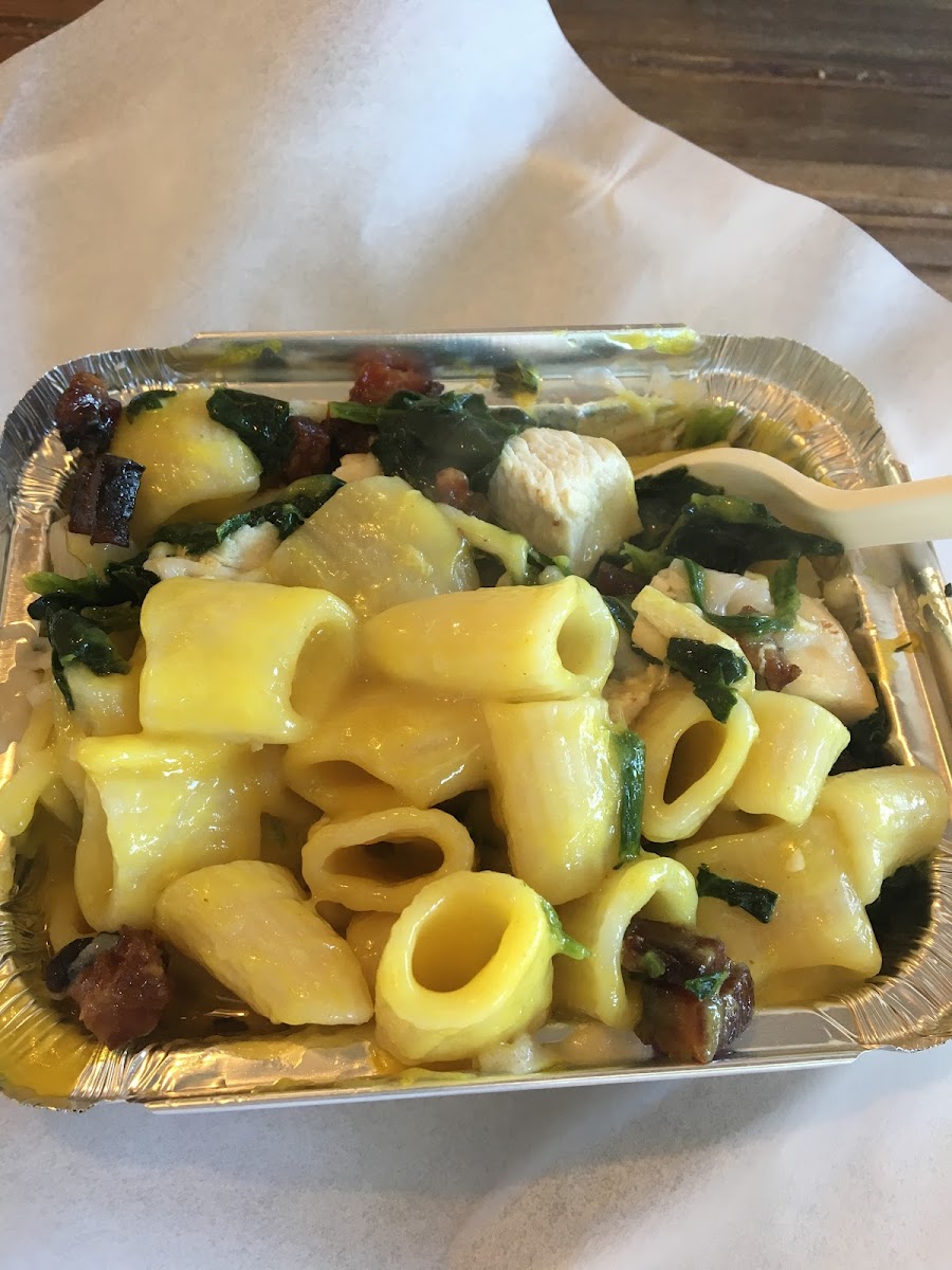 Housemade gf rigatoni with vegan cheese sauce, bacon, chicken and spinach. The best in Rehoboth!