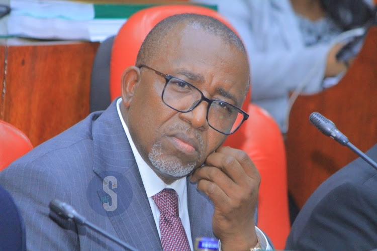 Agriculture Cabinet Secretary Mithika Linturi follows proceedings during the pre-trial hearing of his impeachment by the National Assembly select committee at County Hall on May 7, 2024.