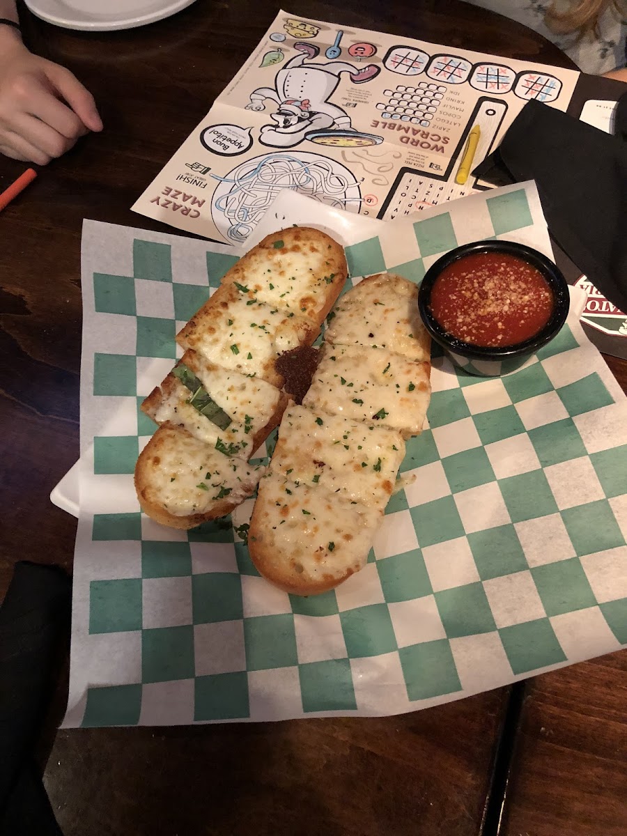 GF garlic bread. Yummy! Notice the green & white checkered paper marking all GF items.