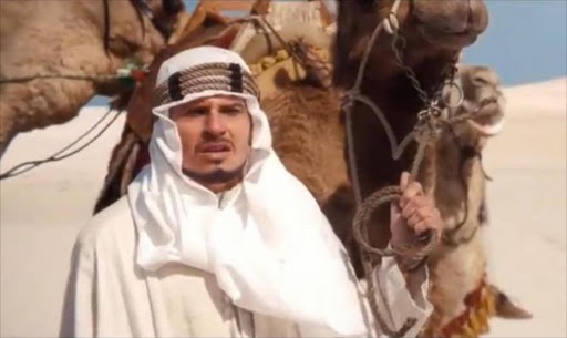 Arab-American groups have sharply criticized a Coca-Cola Super Bowl ad depicting an Arab walking through the desert with a camel. File photo