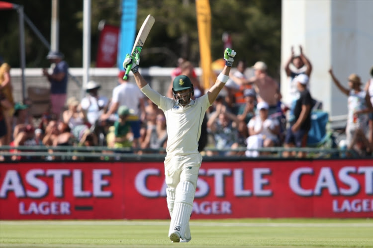 South African captain Faf du Plessis celebrates reaching his century during day 2 of the 2nd Castle Lager Test match between South Africa and Pakistan at PPC Newlands on January 04, 2019 in Cape Town, South Africa.