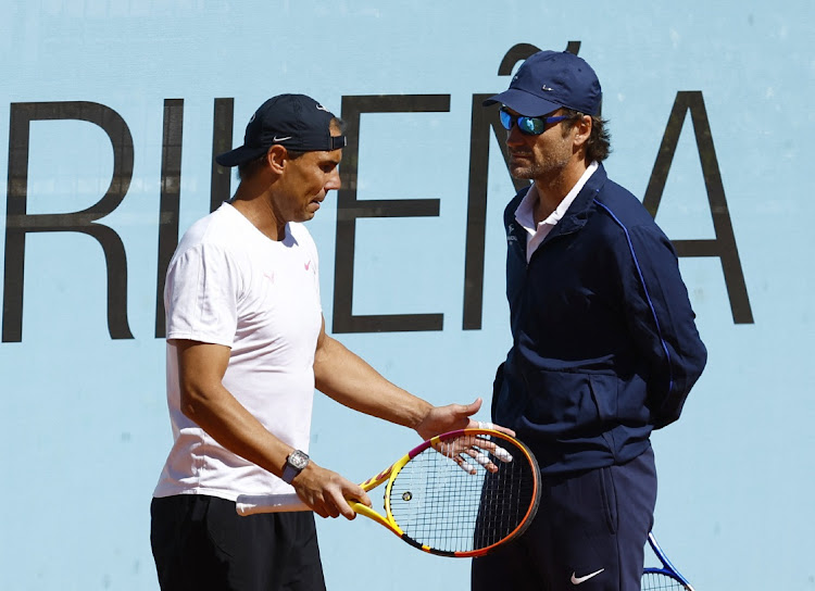 Spain's Rafael Nadal with coach Carlos Moya during a training session at the ATP Masters 1000 Madrid Open in Caja Magica, Madrid on April 24, 2024