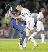 FOUL PLAY SET IN STONE: Italy's Marco Materazzi falls on the pitch after being head-butted by France's Zinedine Zidane (R) during their World Cup 2006 final soccer match in Berlin in 2006.photo: REUTERS