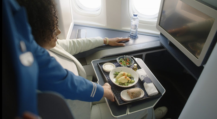 Food being served on a plane