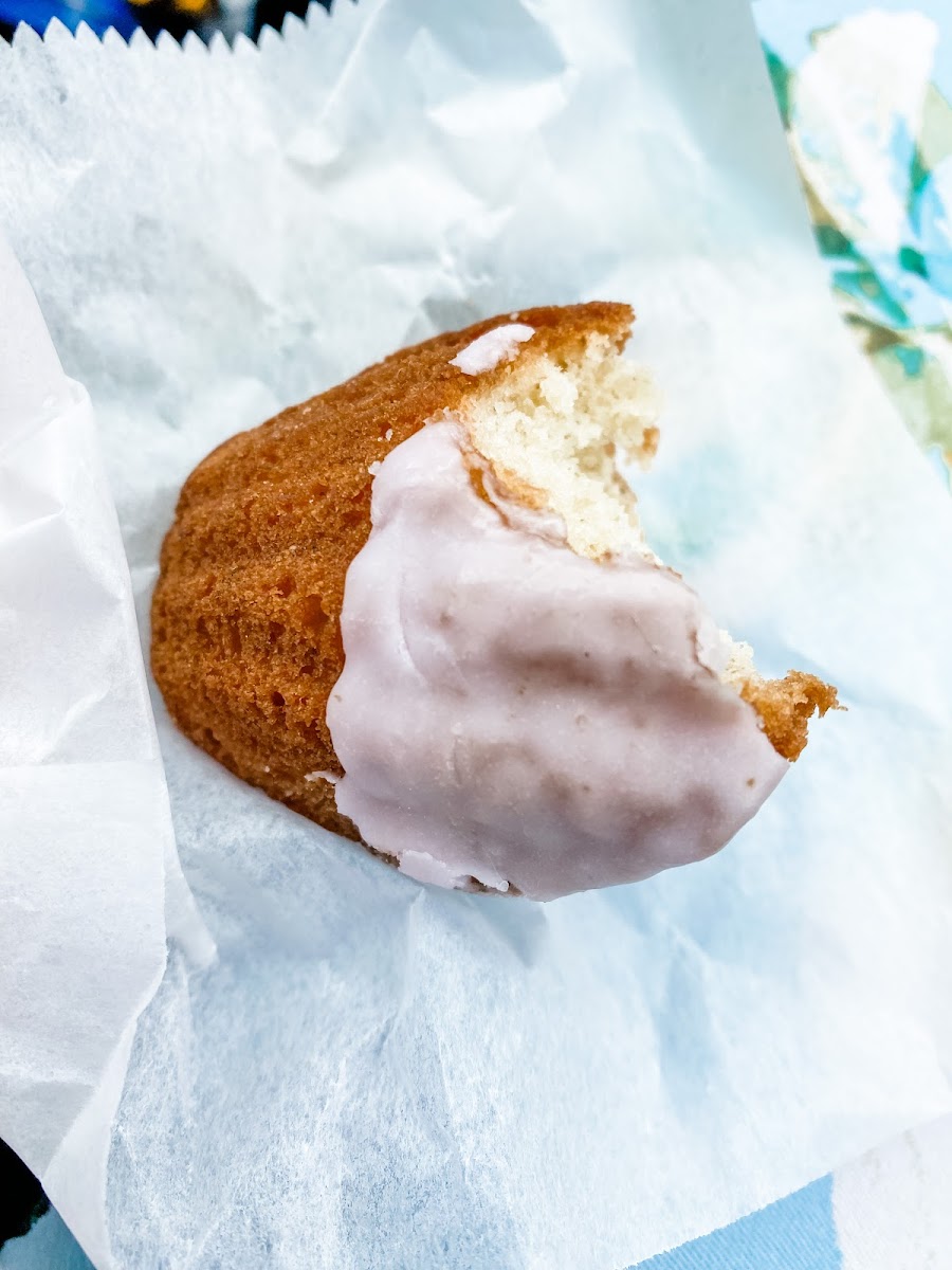 Lavender madeleine with a bite taken out of it