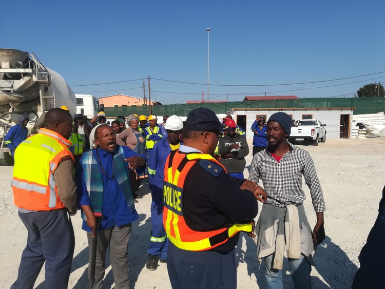 Protesters shut down the construction site of the new Nkululeko Secondary School on Tuesday afternoon claiming that only ANC members were employed to work on the site.