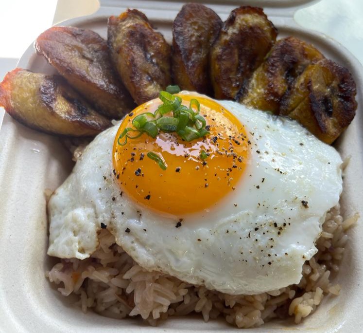 Poor Man’s Fried Rice - Vegetable fried rice served with plantain slices and a sunny side egg on top. (Vegetarian Friendly!). Gluten free.