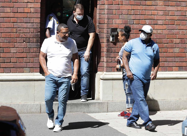 Alleged underworld figures Jerome Booysen, Mark Lifman and William Stevens leave the Cape Town magistrate's court in December after being charged with the 2017 murder of Brian Wainstein.