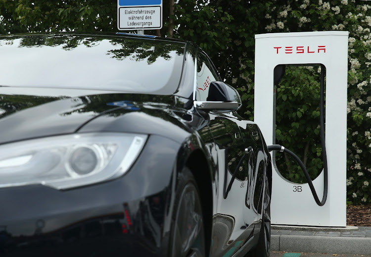 The Tesla fires show that electric vehicles need more, not less, regulation. Picture: SEAN GALLUP/GETTY IMAGES