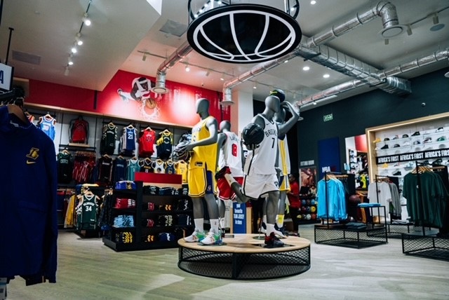 The store features authentic memorabilia from throughout NBA history and a customisation area where fans can personalise NBA jerseys.