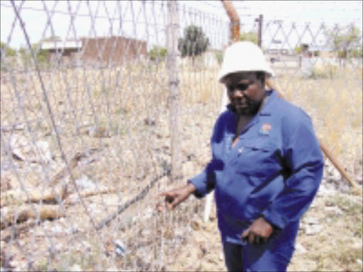 NO BARRIER: Impopeng Fisheries' Mokgadi Moloto wants better fencing.Pic. Unknown.