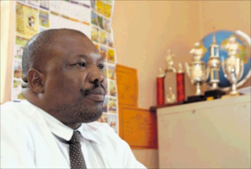 IN TROUBLE: Alfred Maubane High School acting principal Amos Motheogane says he is investigating allegations that pupils pay bribes to get promoted to the next grade. Pic. Bathini Mbatha. 10/02/2010. © Unknown