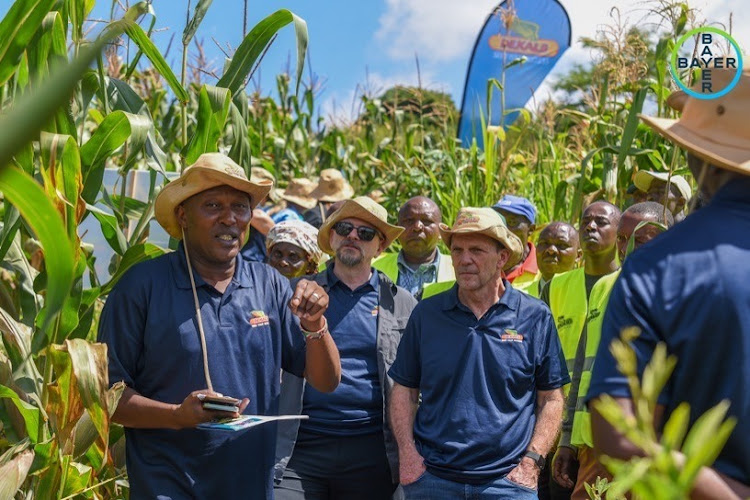 Bayer East Africa Commercial Sales representative, Martin Mutisya with Bayer Crop Science Executives during a recent field visit to smallholder farms in Machakos.
