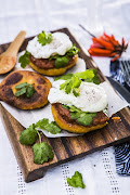 Sweet potato flatbreads topped with poached eggs and spicy tomato sauce.