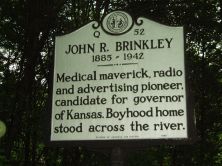 Medical maverick, radio and advertising pioneer, candidate for governor of Kansas. Boyhood home stood across the river.Plaque via North Carolina Highway Historical Marker Program, and is used with...