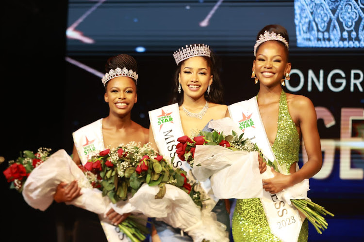 Paige Lynique Harvey crowned Miss Soweto flanking her are runners-up second princess Nhlakanipho Amandla Mkongi and first princess Lethaukuthula Ayanda Maseko finale, held at the Soweto Theatre on Saturday night.