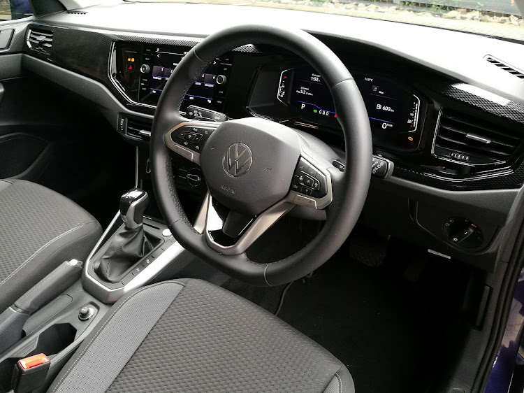 The interior is neat, spacious and suitably digital.