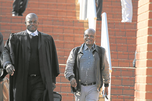 MP Mnyamezeli Booi , right after leaving the Randburg Magistrates Court.