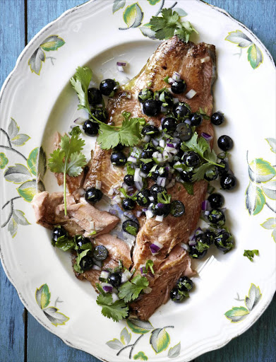 Grilled salmon with blueberry salsa This fruity salsa turns a simple grilled fish dish into something special.