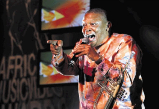SW20050406FRE028:ENTERTAINMENT:MUSIC_MUSIC:06APR2005 - Hugh Masakela Peforms during the 2005 Channel O African Music Video Awards held in Johannesburg. Where he was awarded a Special Recognition. Thursday 31 March 2005.( Photo/Cathy Pinnock.) ------ mainbody weekpics colour 38cm wide johan 5239