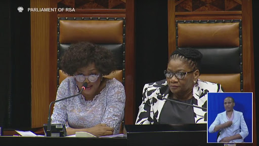 Speaker Baleka Mbete and NCOP chair Thandi Modise argue with EFF leader Julius Malema during the State of the Nation Address in Parliament on Thursday.