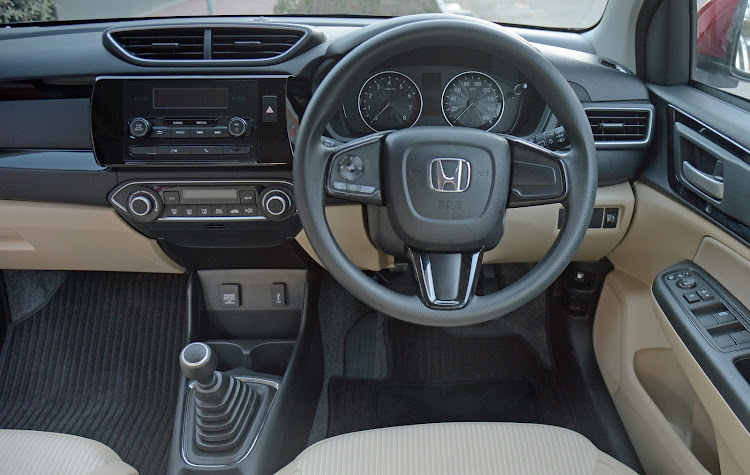 Simple, straight-forward layout bolstered by attractive seat covers. Picture: SUPPLIED