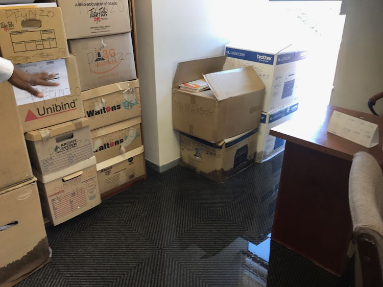 Boxes containing documents at the Public Protector's office have been affected by the flooding.
