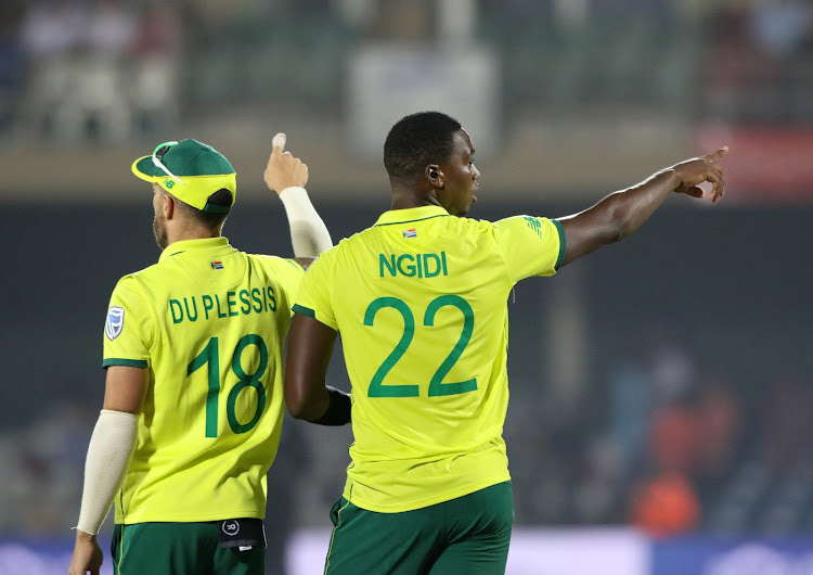 Faf Du Plessis and Lungi Ngidi of South Africa set the field during a match. Ngidi will miss the ODI series against Pakistan because of injury.