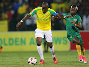 Kudakashwe Mahachi (R) of Golden Arrows and Mamelodi Sundowns captain Hlompho Kekana tussle for the ball during the Absa Premiership match at Princess Magogo Stadium on April 28, 2017 in Durban, South Africa. (Photo by Anesh Debiky/Gallo Images)