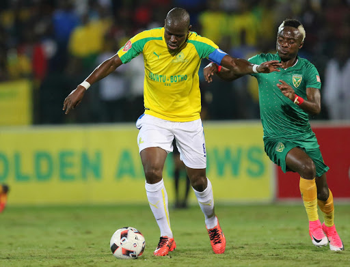 Kudakashwe Mahachi (R) of Golden Arrows and Mamelodi Sundowns captain Hlompho Kekana tussle for the ball during the Absa Premiership match at Princess Magogo Stadium on April 28, 2017 in Durban, South Africa. (Photo by Anesh Debiky/Gallo Images)