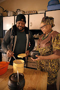 Lesego Semenya and his mother preparing mageu.
