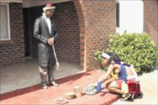 ROYAL MATTER: Prince Melizwe Dlamini and a Zulu maiden performing the Nomkhubulwane ritual. Pic. THULI DLAMINI. 06/09/2009. © Sowetan.