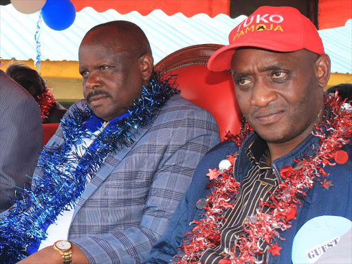 Bomet Governor Isaac Rutto with National Water Conservation and Pipeline Corporation chairman Julius Kones in Konoin constituency, Bomet county, last Friday / FELIX KIPKEMOI