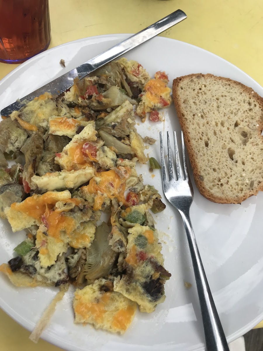 Veggie omelette with artichokes and gluten free bread. They didn’t toast it so they wouldn’t cross contaminate, which I appreciated