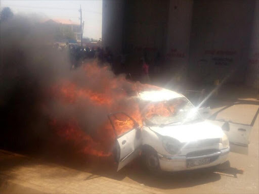 The car torched by the youths in Kondele./FAITH MATETE