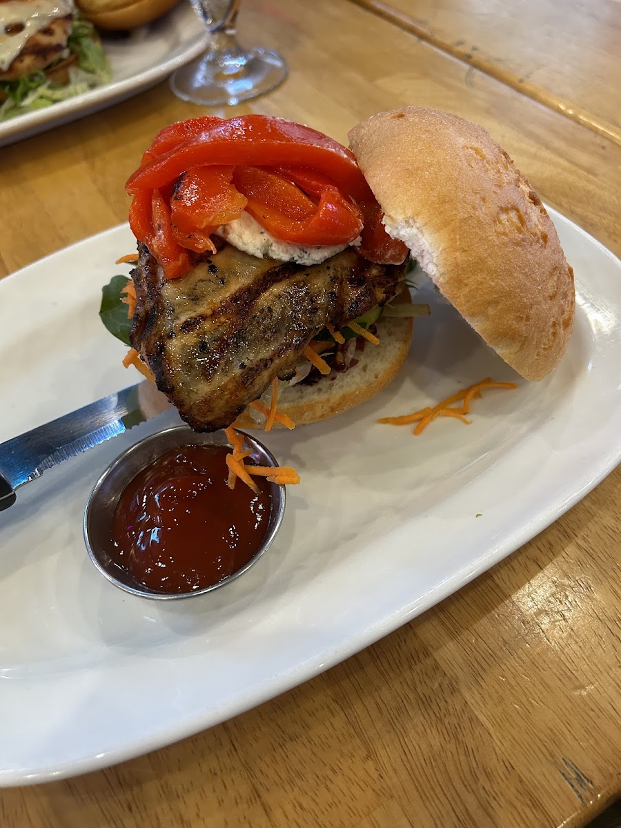 BYO Burger (chicken breast on GF bun with lettuce blend, herbed goats cheese, habanero salsa, tomato, cucumber, carrot strings & roasted red peppers)