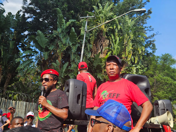 EFF party leader Julius Malema and Mbuyiseni Ndlozi outside the presidential residence