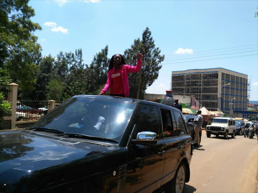 Hellen Obiri being driven in Kisii town on Sunday./ANGWENYI GICHANA