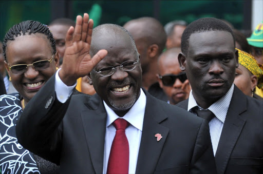 Tanzania’s John Magufuli greets ruling party members after being declared winner of the presidential elections.