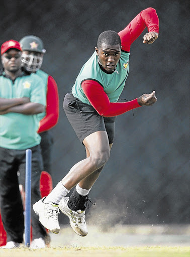 Zimbabwe's Stuart Matsikenyeri bowls during a practice session ahead of the World Twenty20 opener against Sri Lanka in Hambantota, Sri Lanka, today Picture: DINUKA LIYANAWATTE/REUTERS