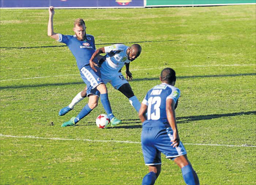 THICK OF THINGS: SuperSport United striker Jeremy Brockie tries to control the ball while Chippa United midfielder, Sandile Zuke, closes him down during their Cup semifinal played at the Sisa Dukashe Stadium in Mdantsane on Saturday. SuperSport won 4-2 on penalties Picture: MICHAEL PINYANA