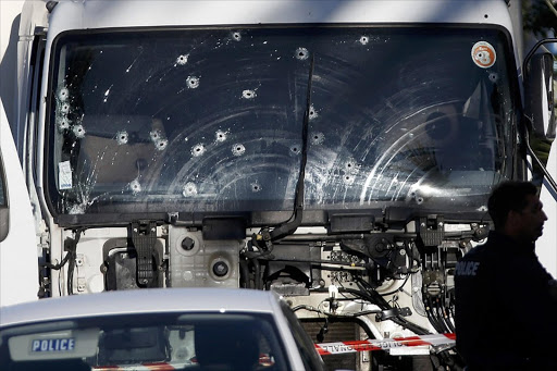 Bullet imacts are seen on the heavy truck the day after it ran into a crowd at high speed killing scores celebrating the Bastille Day July 14 national holiday on the Promenade des Anglais in Nice, France, July 15, 2016. Picture credits: Reuters